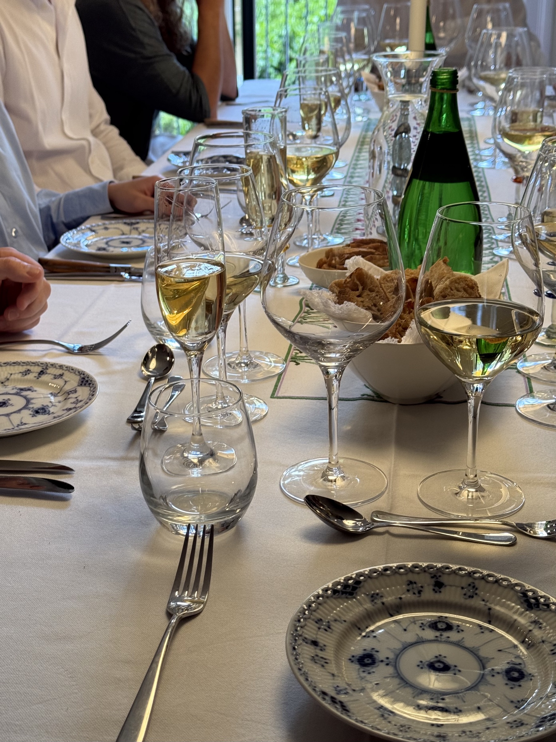 A long dinner table set for a PotusChef pop-up